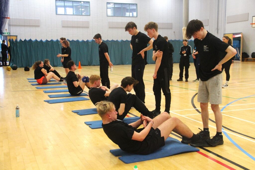 Students completing sit ups